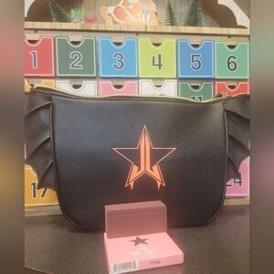 Jeffree Star bat bag with Wierdo eye shadow and Hershey make up sponge.